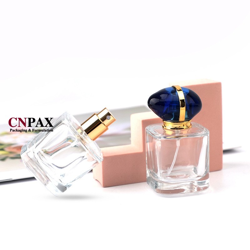 perfume bottle with sapphire cap