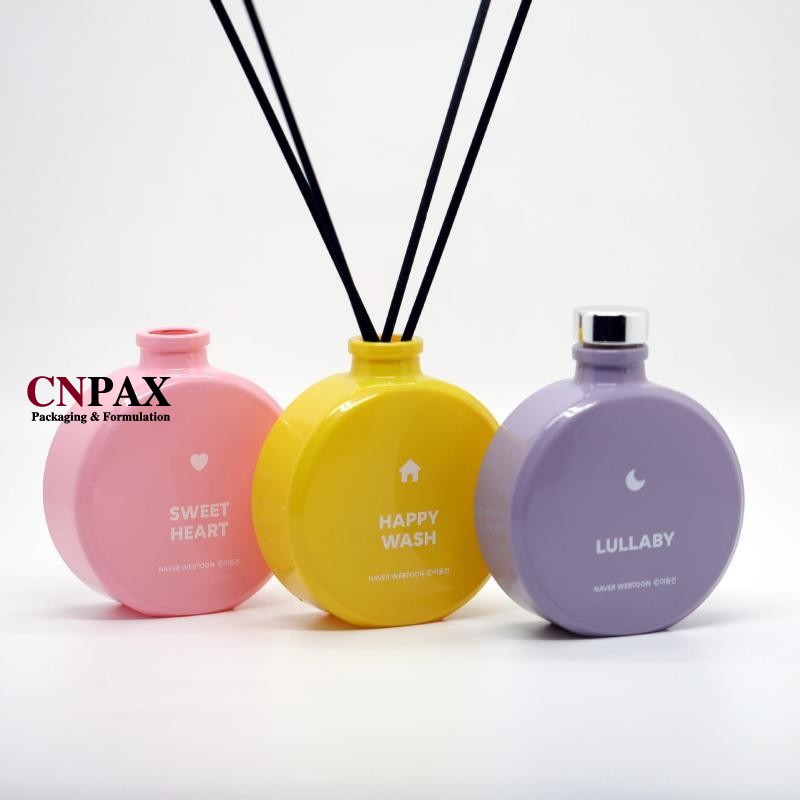 Migliora la tua casa con le squisite bottiglie con diffusore in vetro piatto rotondo da 100 ml di CNPAX Packaging