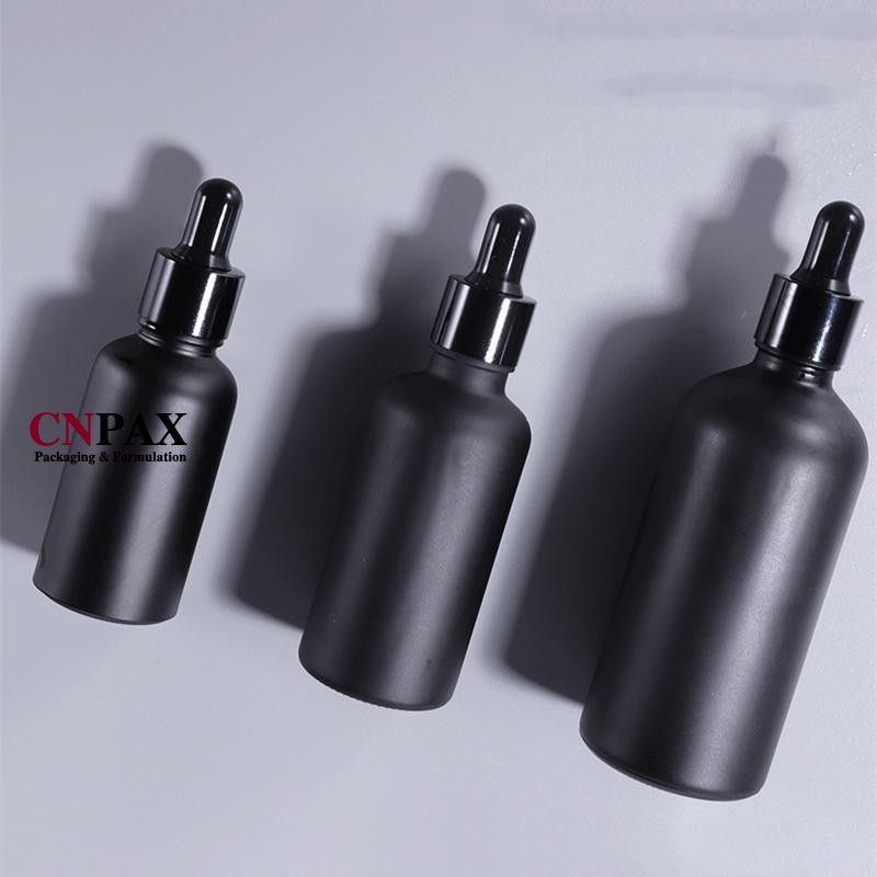 100 ml frosted matte black serum bottles