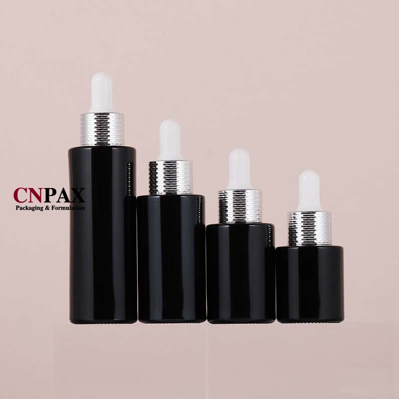 in stock black glass bottle with silver serum dropper